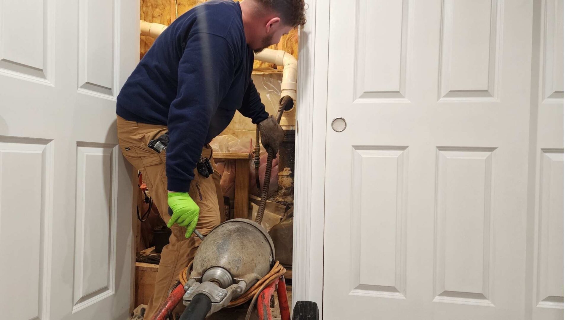 drain cleaning service removing buildup from residential plumbing system